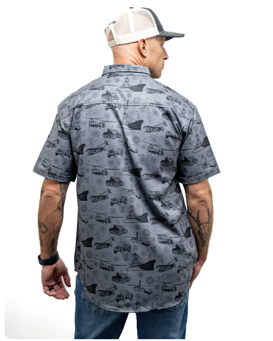 Nine Line Patriotic Button-Down: gray short-sleeve shirt with all-over military vehicle and insignia print, modeled from the back
